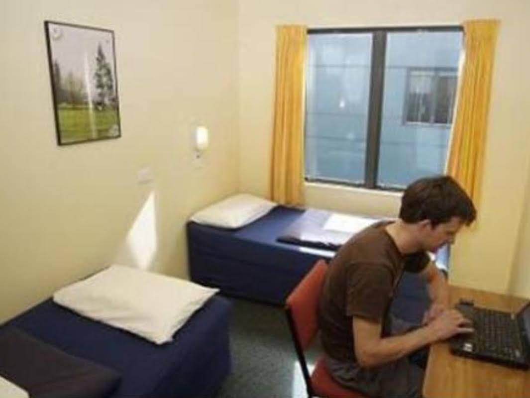 Haka House Wellington Hostel Ngoại thất bức ảnh A student working in his room at the International House
